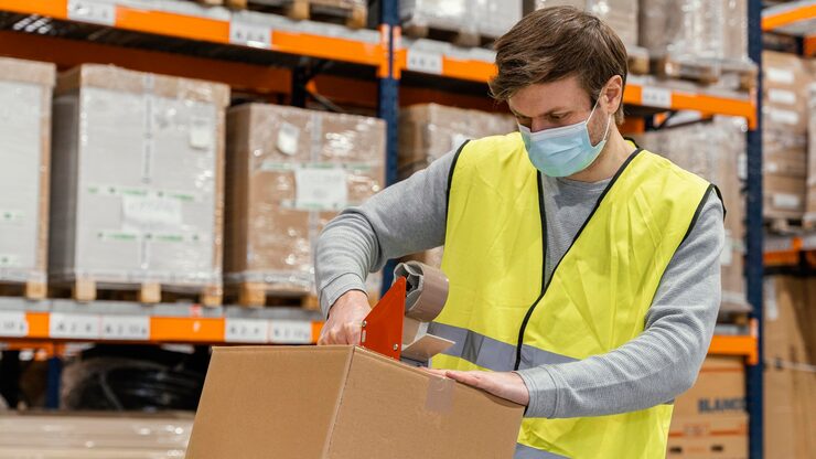 man warehouse working with packages 23 2148886841